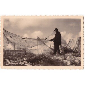 394. Palanga, žvejas tvarko tinklus